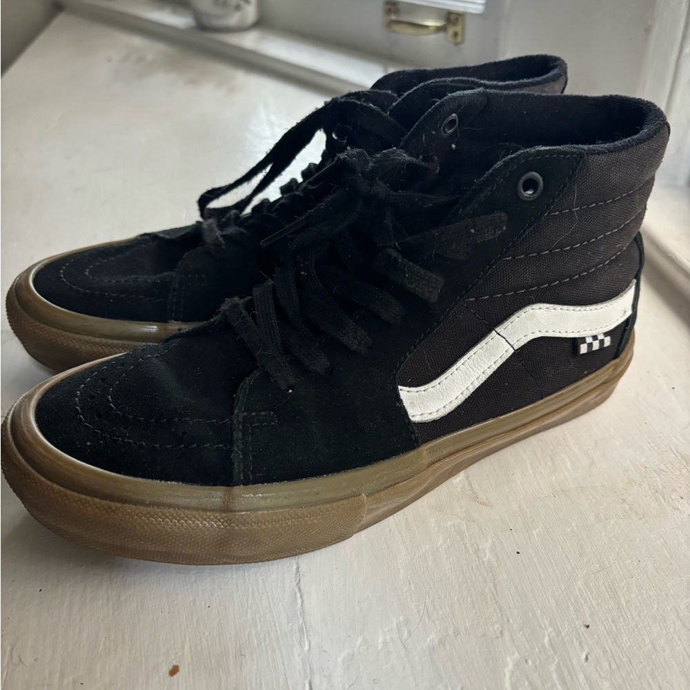 Vans Black and White High-Top Sneakers